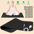 Yoga mat with a woman sitting on it, showing different sizes and features.